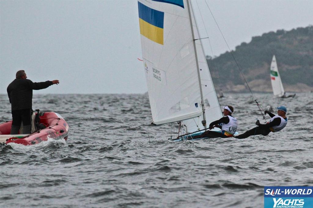 Ukraine get some tune-up from their coach before the start of racing - Mens 470 © Richard Gladwell www.photosport.co.nz